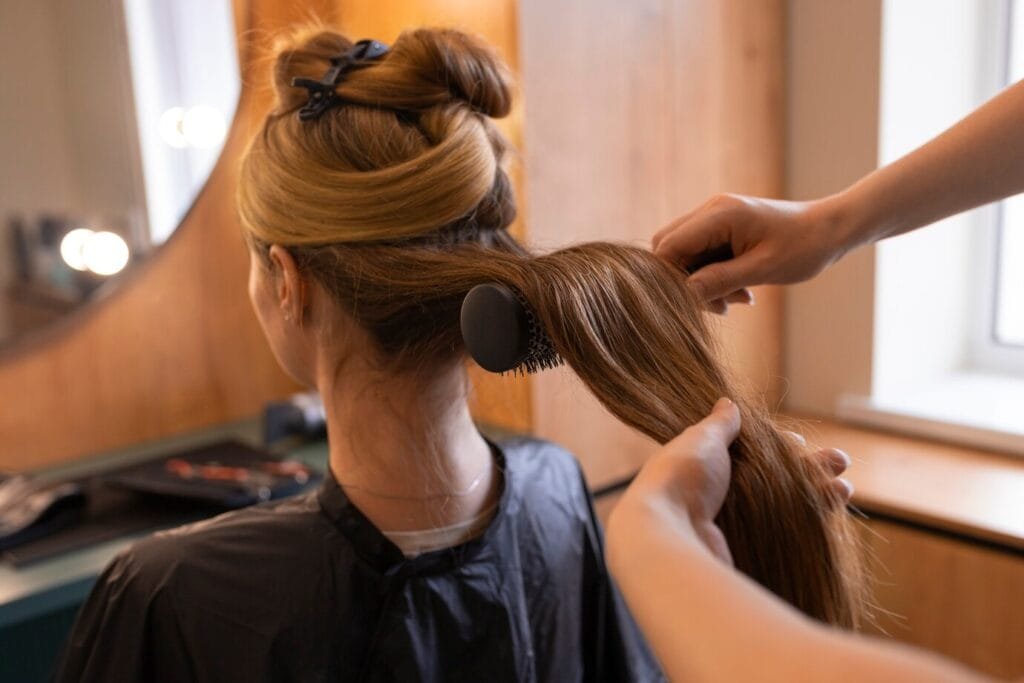 female-client-getting-her-hair-done-hairdresser_23-2150771262